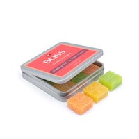 gummy bears in a tin on a white background
